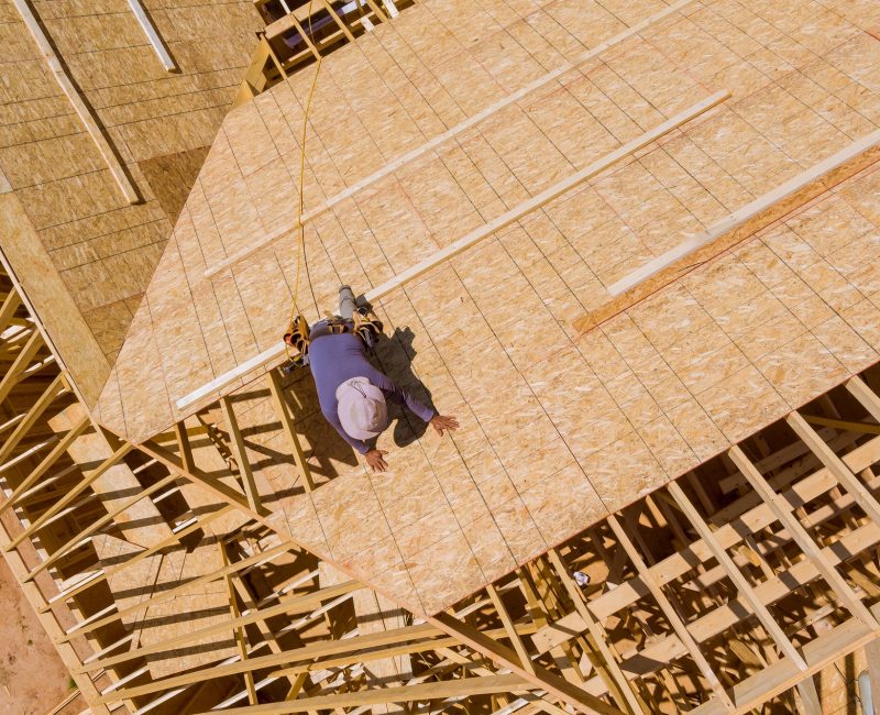 Home roof construction site with all installed new plywood